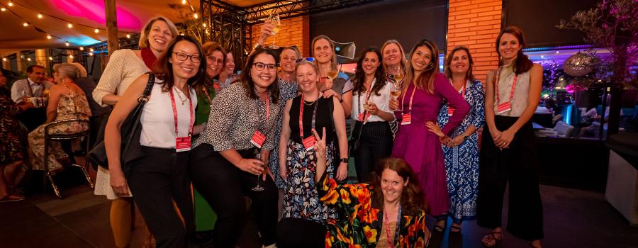 A group of businesswomen at a conference dinner