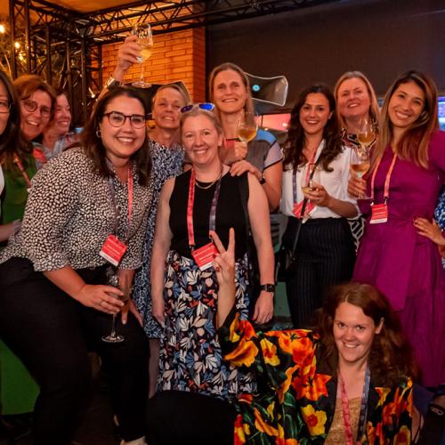 A group of businesswomen at a conference dinner